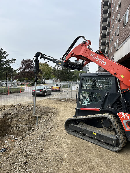 diamondtech compact track loader drilling