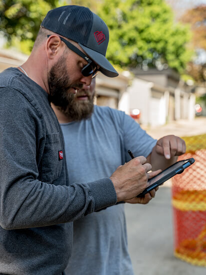 diamondtech workers using digital tablet